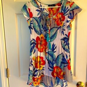 3/4 tunic with cap sleeves. tropical print with embellished front tie